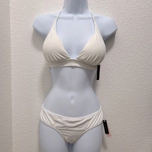 Brand new with tags, push up halter top with cheeky bottom. Top XS, bottom S